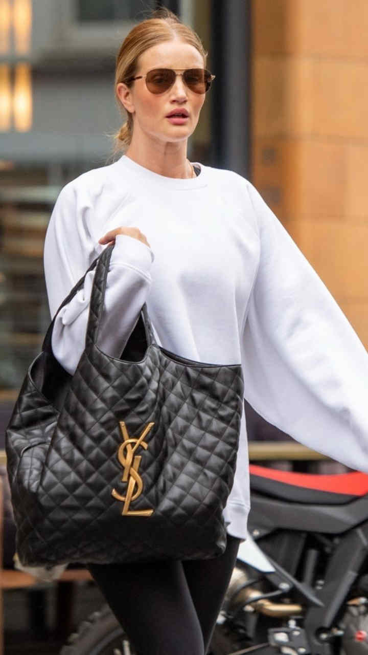 GIRL.BLACK: ROSIE HUNTINGTON-WHITELEY HEADING TO A GYM, IN LONDON. SOPHISTICATED STYLE.